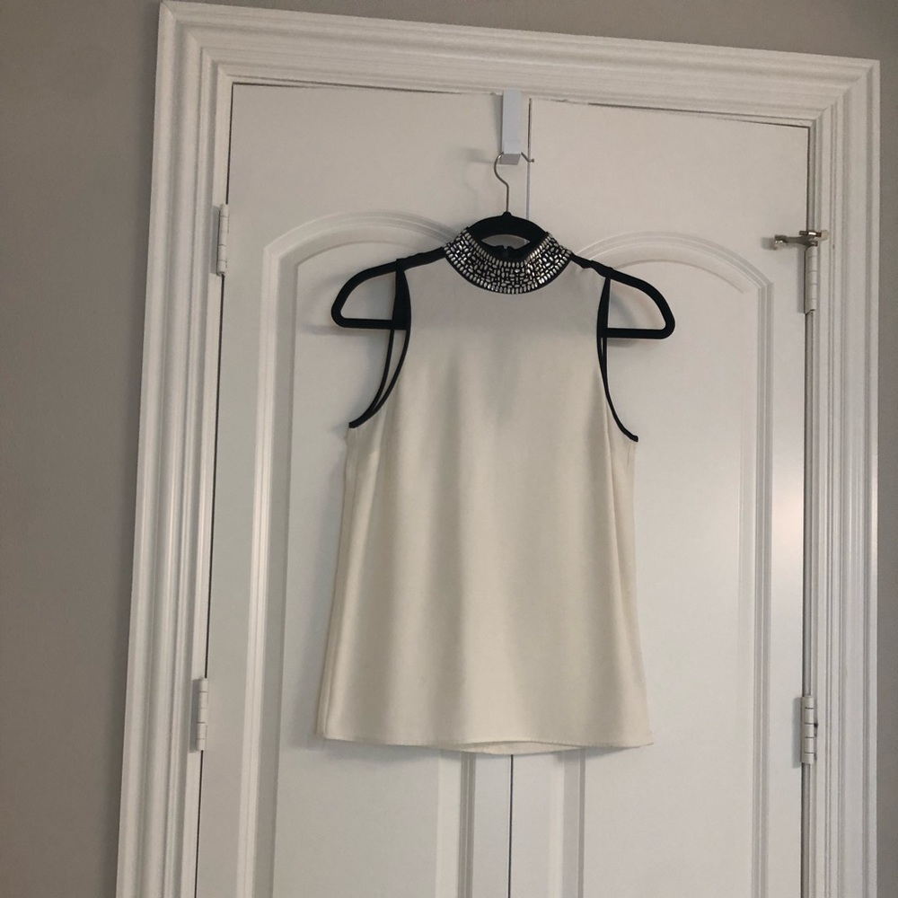 MICHEAL KORS Fun top for jeans or black pants,Rhinestones around neckline